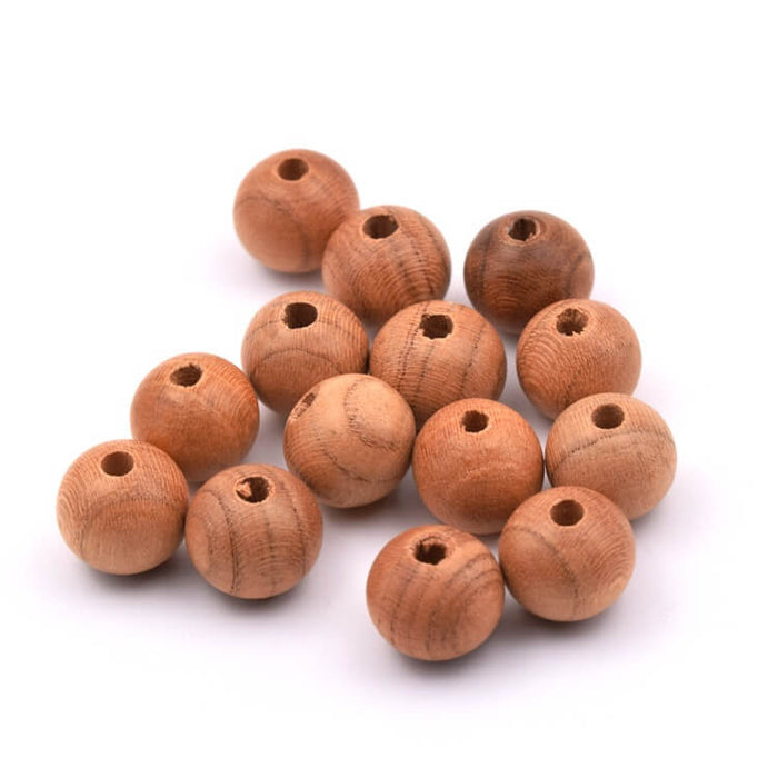 Perle ronde en bois 10mm - Trou 2mm (40)
