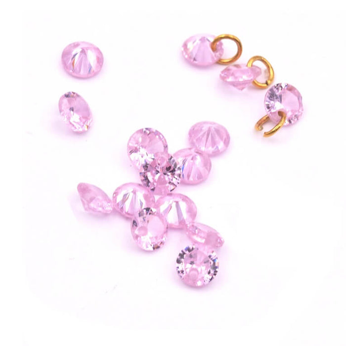 Petite breloque en verre taillé rose 4x2mm - trou-0.7mm (10)