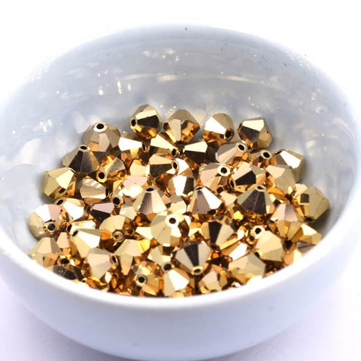 Kaufen Sie Perlen in der Schweiz Preciosa Bicone Crystal Aurum Full 5,7x6mm (10)