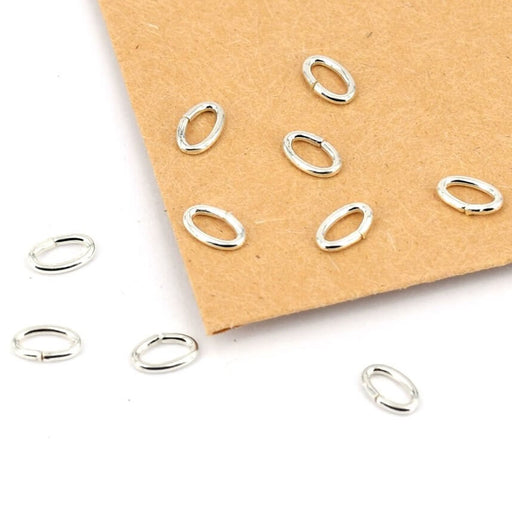 Kaufen Sie Perlen in der Schweiz Sprungring oval Sterlingsilber - 5x3x0.7mm (10)