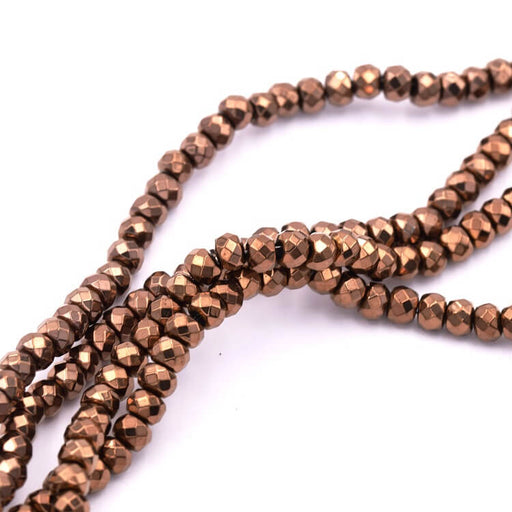 Kaufen Sie Perlen in der Schweiz Facettierte Rondelle-Perle, synthetischer Hämatit, Bronze, 4 x 3 mm (1 Strang – 40 cm)