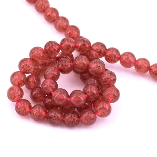 Kaufen Sie Perlen in der Schweiz Erdbeerquarz-Rundperle 6 mm – Loch 1 mm (1 Strang – 38 cm)