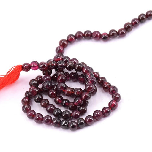 Kaufen Sie Perlen in der Schweiz Runde Perle Granat 4 mm – Loch 0,6 mm (1 Strang – 32 cm)