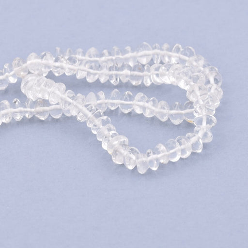 Kaufen Sie Perlen in der Schweiz Quarzkristall-Knopfperle 5–6 x 3–4 mm – Loch: 0.5 mm (1 Strang – 33 cm)