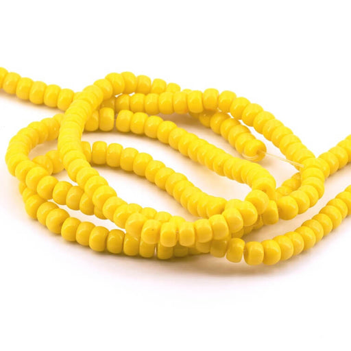 Kaufen Sie Perlen in der Schweiz Donut-Rundglasperle gelb – 6 x4mm – Loch: 1mm (1 Strang – 40 cm)