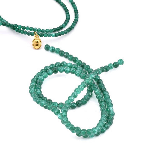 Kaufen Sie Perlen in der Schweiz Runde Perlen Natürliches Jadegrün gefärbt - 3 mm - Loch: 0,8 mm (1 Strang - 37 cm)