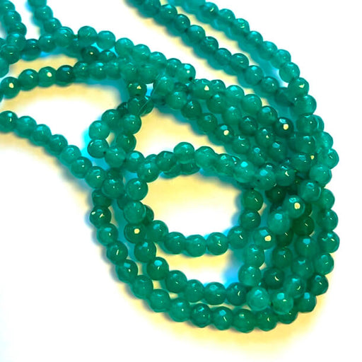 Kaufen Sie Perlen in der Schweiz Jade Natur gefärbte GREEN DUCK facettierte Perlen - 4mm (1 Strang)