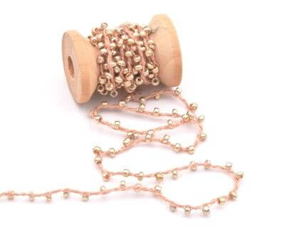 Kaufen Sie Perlen in der Schweiz Baumwollschnur dune mit rocailles-perlen GOLDEN hell ROSA (90cm)