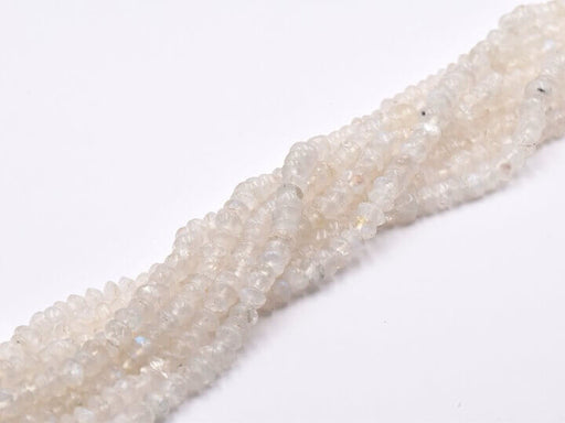 Kaufen Sie Perlen in der Schweiz Heishi Perlen Chips Mondstein Doppelkegel 5mm, Loch 0,5mm, 35cm (1 Strang)