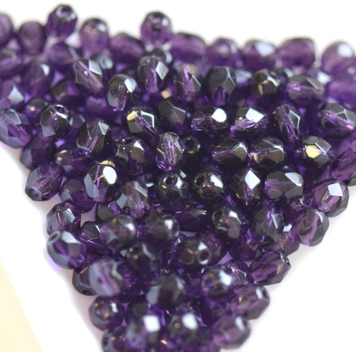 Kaufen Sie Perlen in der Schweiz Glasschliffperlen tanzanite 4mm (100)