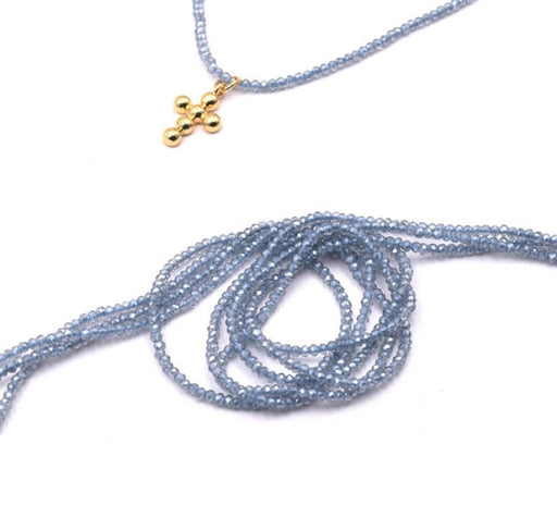 Kaufen Sie Perlen in der Schweiz Glasperlen facettiert Stahlblau AB, rund 2mm - Loch 0.6mm - Litze 36 cm (1 Strang)