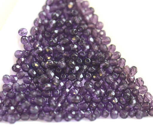 Kaufen Sie Perlen in der Schweiz Glasschliffperlen tanzanite 2mm (50)
