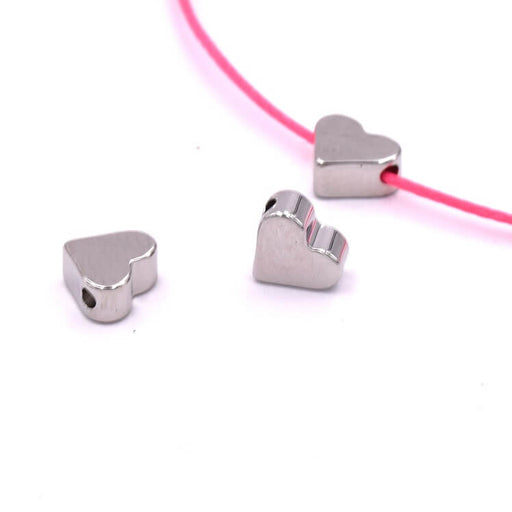 Achat Perle coeur laiton couleur platine 6x7x3mm - Trou: 1.2mm (2)