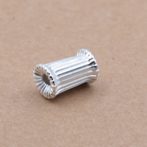 Achat Perle tube cylindre rainuré laiton argenté- 9x6mm - Trou: 1.8mm (1)