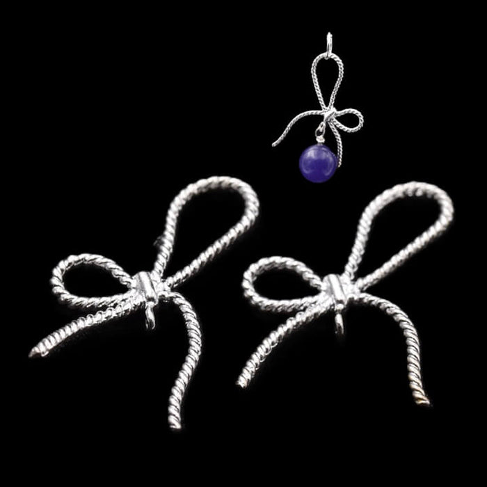 Pendentif noeud en laiton argenté 18x26mm avec anneau - Trou: 1mm (2)