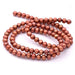 Perle d'eau douce ronde marron cuivré 4.5-5mm (1fil-40cm)