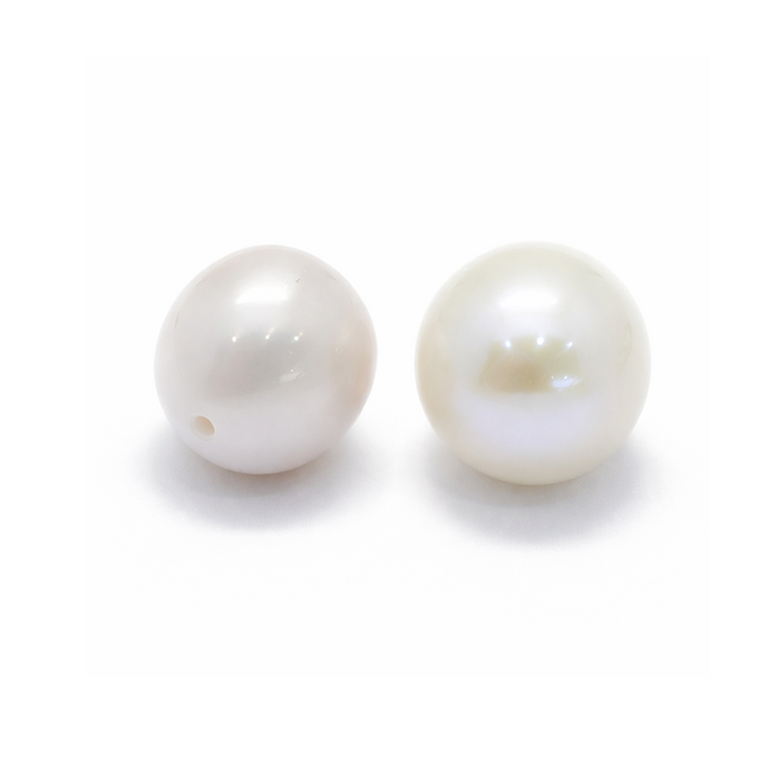 Perles d'eau douce ovales light cream semi percées 10x9mm - Trou: 0.8mm