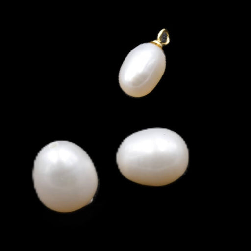 Perles d'eau douce ovales blanches, demi-percées 9x7 mm - Trou : 0,9 mm (2)