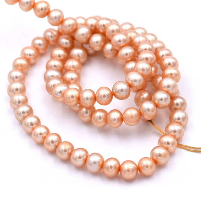 Perles d'eau douce rondes potatoe champagne - 5x4mm - Trou: 0.6mm (1 fil)