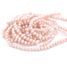 Perles d'eau douce rondes potatoe beige poudré 4.5-5mm sur fil (1)
