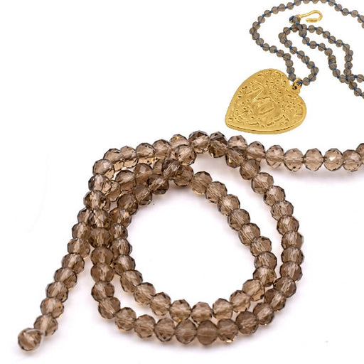 Kaufen Sie Perlen in der Schweiz Facettenbesetzte Glasrondellen – Black diamond – 4 mm (1 Strang – 39 cm)