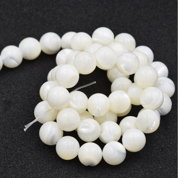 Perles à facettes nacre coquillage 2.5mm Trou 0.5mm 37cm (1 rang)