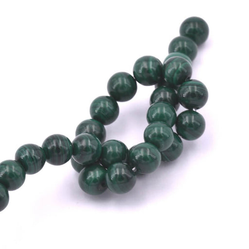 Perle ronde malachite 6mm - trou 0.8mm (1 fil-20cm)