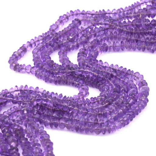 Kaufen Sie Perlen in der Schweiz Knopfperle in dunklem Amethyst. 4–5 x 2–4 mm – Loch: 0.5 mm (1 Strang – 34 cm)