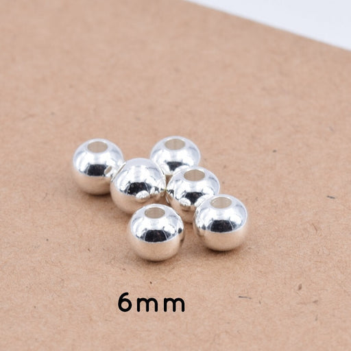 Achat Perles Rondes en Acier Inoxydable Argenté - 6x5mm - Trou : 2mm (10)