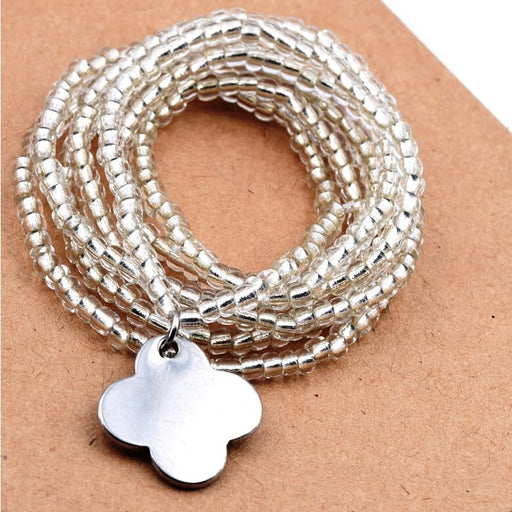 Kaufen Sie Perlen in der Schweiz Lange Halskette Armband Rocailles Silver Line Elastic und Steel klee 19x19mm (1)