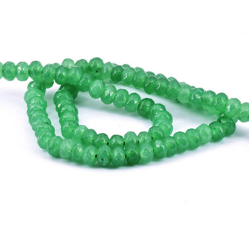 Kaufen Sie Perlen in der Schweiz Facettierte runde Perle in Jadegrün – 6x4 mm – Loch: 1mm (1 Strang – 34 cm)