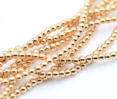 Perles d'hématite reconstituée doré or fin clair 3 mm - 1 rang - 150 perles (vendue par 1 rang)